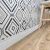Zócalo Epsilon Reforma Line 120Mm X 2.44 M Blanco Mate colocado en habitacion